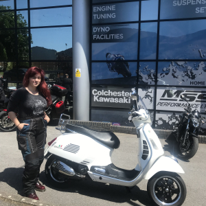 Charlotte collecting her Vespa GTS Super 300